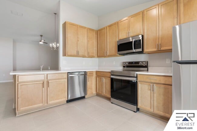 Building Photo - FULLY FENCED, LIKE NEW 3/2/1 TOWNHOUSE ON A CUL DE SAC IN BEAUTIFUL SEMINOLE WOODS