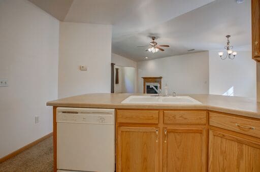 Upper unit kitchen into great room with FP - 325 Henry Dr