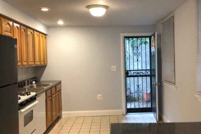 Kitchen door to Yard - 3200 Haverford Ave