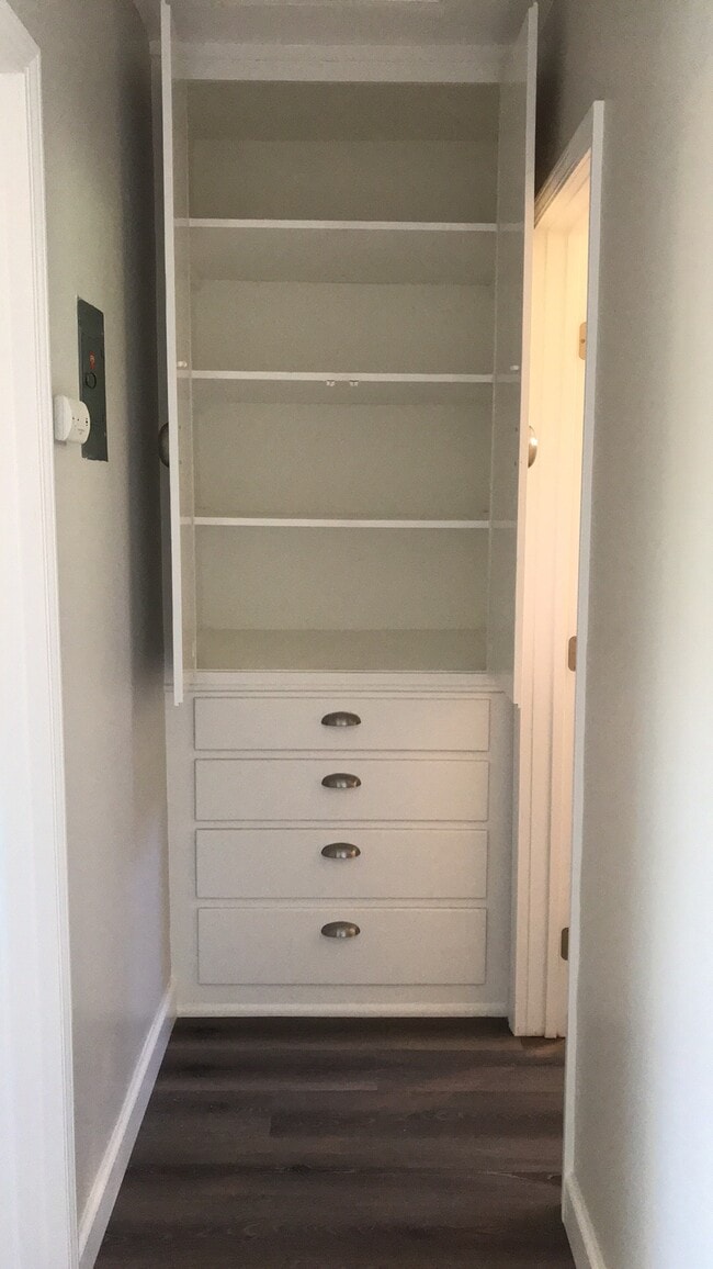 Linen closet with drawers in hallway - 731 Oro Ter