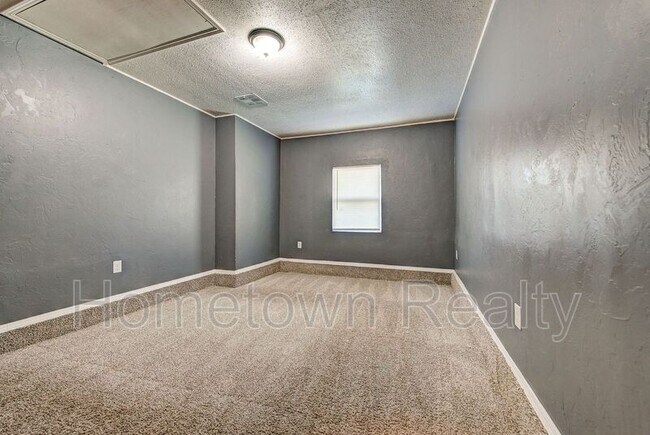 Building Photo - 8616 N Harvey Ave