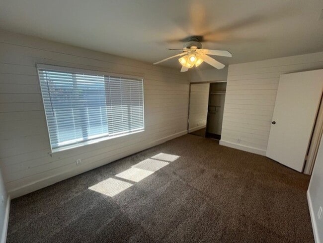 Building Photo - PETS OK!  2-story townhome with 2 bedrooms...