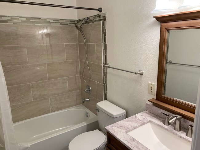 Building Photo - 2201 E 66th Ave