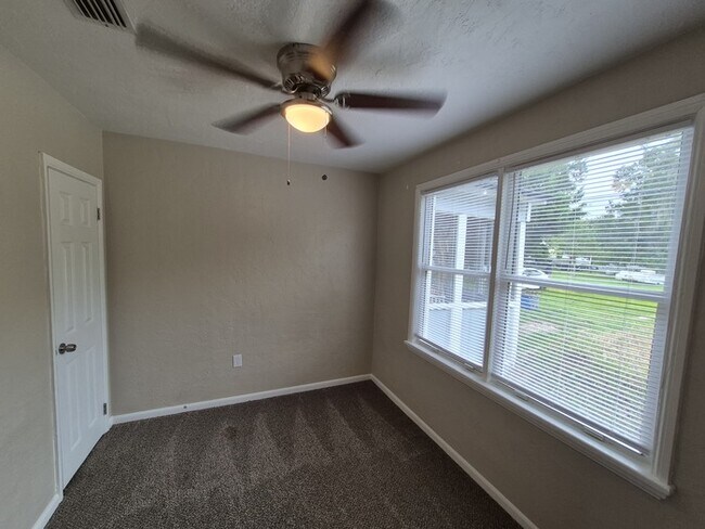 Building Photo - Spacious 4-Bedroom Home with Detached Gara...