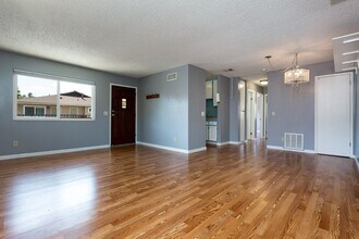Building Photo - Adorable Upper Unit Condo with 1 Car Garage!