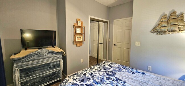 Building Photo - Stunning First-Floor, Fully Furnished Condo with Pond Views