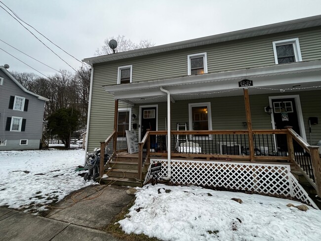 Frontdoor & side yard - 22-24 E Main St