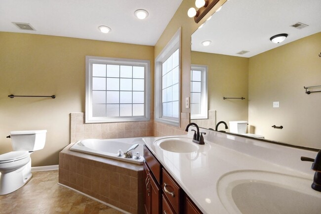 Building Photo - Pet Friendly Three Bedroom with Bonus!