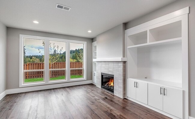 Building Photo - Bethany Stunner - 5 Bedrooms with Main-Level Bed & Bath, Modern Kitchen & Private Fenced Yard