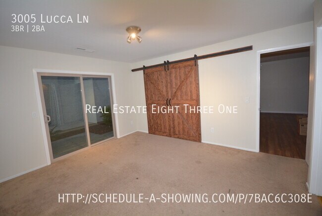 Building Photo - 3 bedroom 2 bath with 2 car garage and pri...