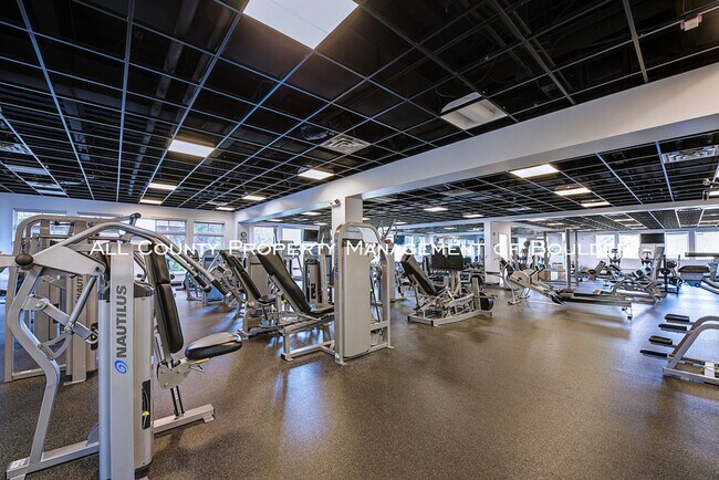 Building Photo - Enjoy Amazing Amenities at the Peloton!