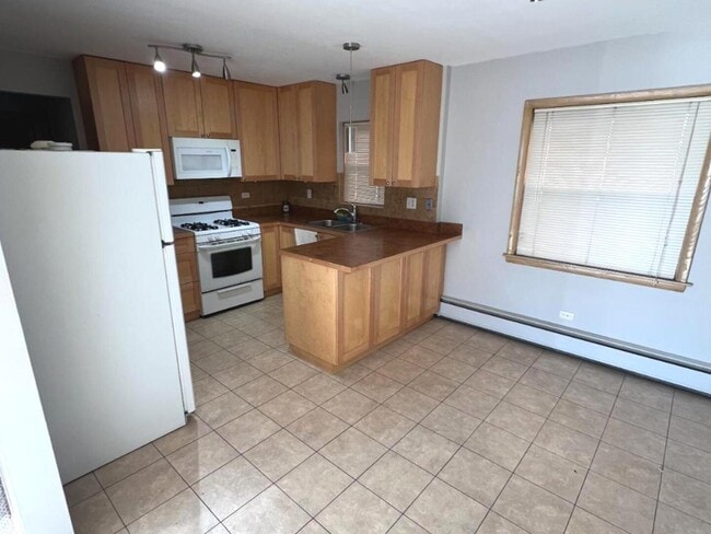 Building Photo - 6636 N Harlem Ave