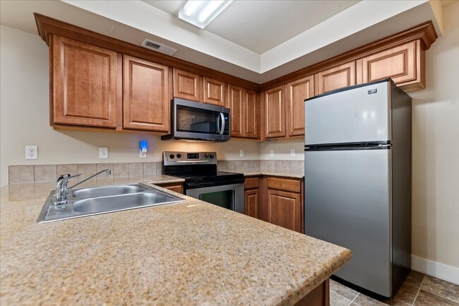 Building Photo - 9824 W Rosecroft Ct