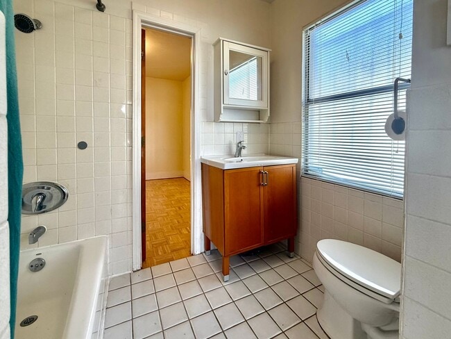 Building Photo - Cozy 2+bdrm/1 bath home w/a huge basement, washer/dryer, & off street pkg, space in the heart of ...