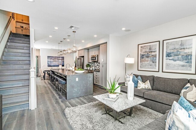 Building Photo - Stunning Fully Furnished Tri-Level Townhome 4BD/4BATHS! Central AC/Heat with Solar! 2 Car attache...