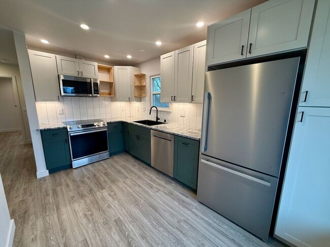 Building Photo - Immaculate FULL-REMODEL: 3 Bed 2 Bath Spokane Home w/ Brand New Everything!!