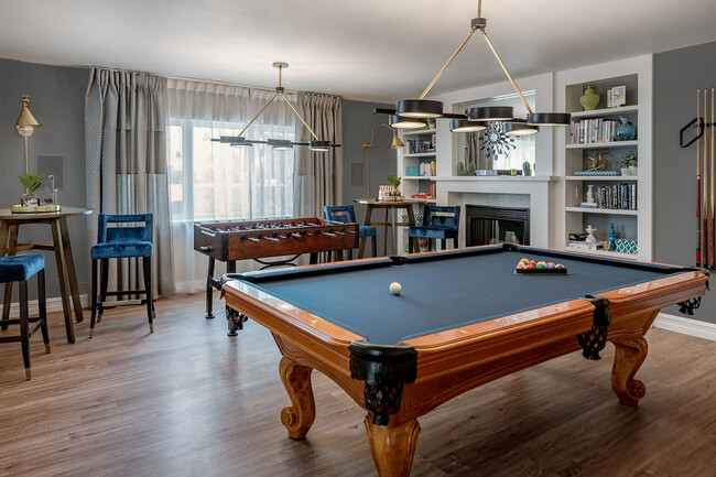 Whether you're a fan of board games, video games, pool, this room has something for everyone - 71535 Biskra Rd