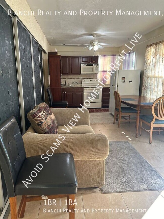 Building Photo - Furnished 1-Bedroom Apartment with Utiliti...