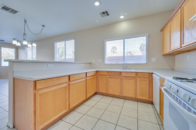 Building Photo - NW!! POOL!!!! GATED!!! Com. Park!!! Low Maintenance desert landscape front Yard. New Carpet!! Ups...