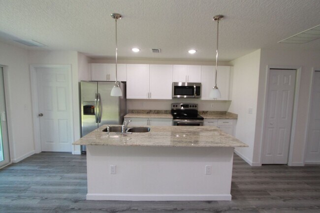 Building Photo - AWESOME 4 BD/2BA Home in Palm Bay!!