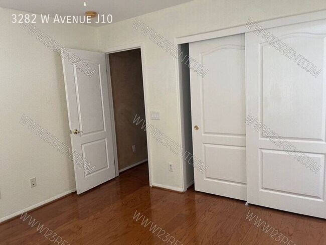 Building Photo - 3282 W Ave J 10