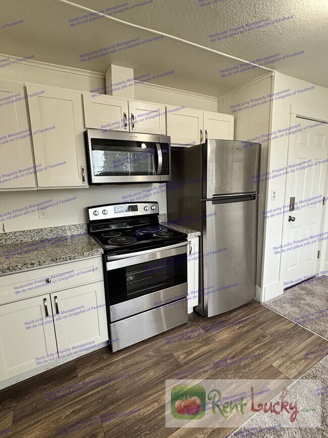 Building Photo - Singh Tacoma 4-Plex