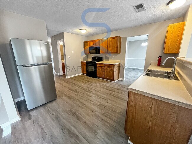 Building Photo - Move in before October 15th and choose you...