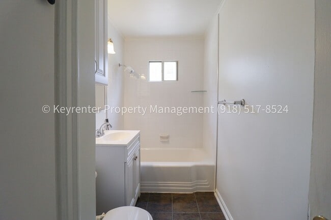 Building Photo - Gorgeous duplex unit on large lot with garage -- NO PETS ALLOWED