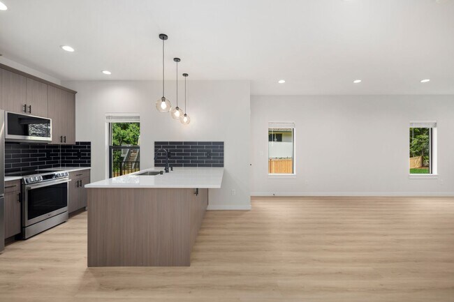 Building Photo - $2595 3 bedroom/2 1/2 bath Clearwood New Construction, Custom Chalet-style Home In Yelm.
