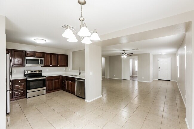 Building Photo - 15589 W Port Au Prince Ln