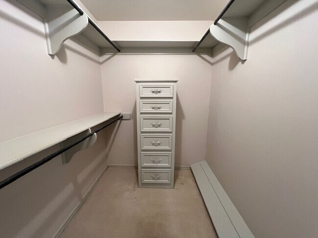 Building Photo - Step into this inviting, sunlit home where space and comfort blend seamlessly