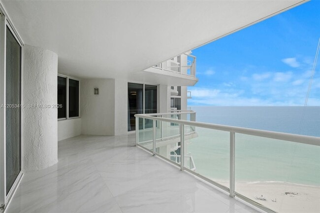 Building Photo - 18671 Collins Ave