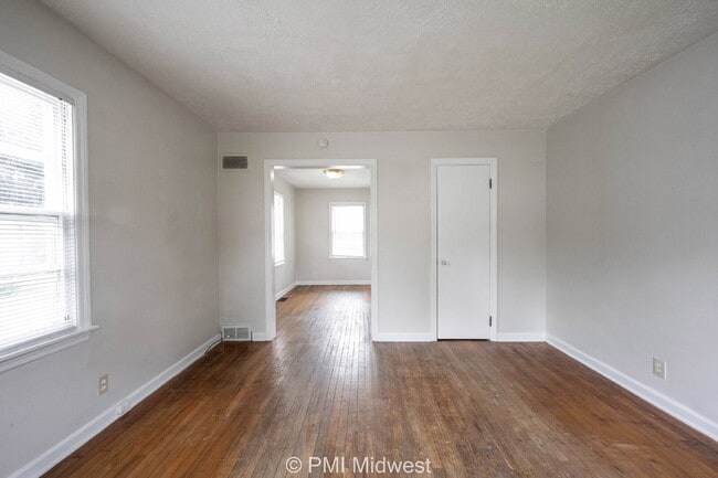Building Photo - "Charming 2-Bedroom Duplex with Gleaming Hardwood Floors in Indy!"