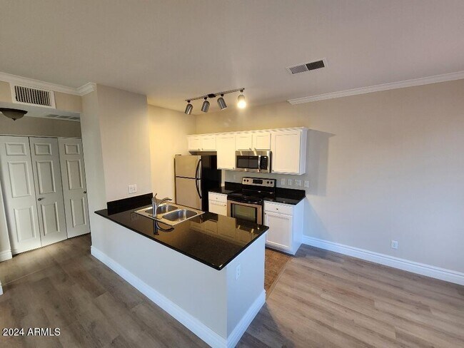 Building Photo - 7009 E Acoma Dr