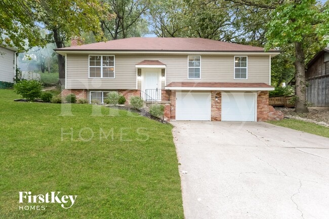 Building Photo - 5905 NW Whispering Oaks Ln