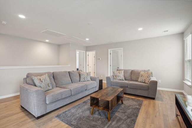 Building Photo - Impressive home in Oakfield loaded with up...