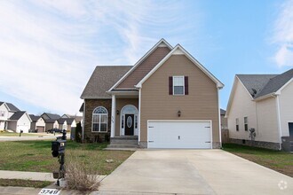 Building Photo - Pet Friendly Three Bedroom with Bonus!