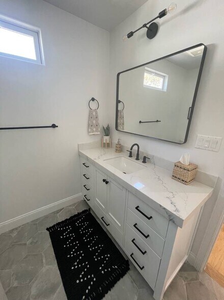 Primary (en suite) bathroom vanity - 1644 Wellesley Ave
