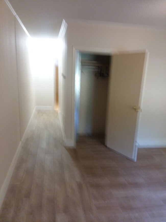 Hallway from living room to Bath, Kitchen Bedroom - 545 School Rd