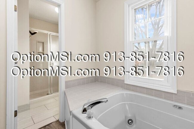 Building Photo - Welcome home to this charming two-story in South Woods subdivision