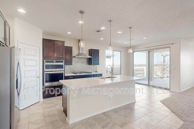 Building Photo - 6405 Kings Cyn Cv NE