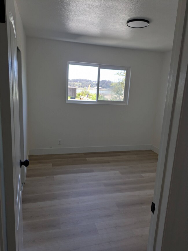 Building Photo - **Spacious 4-Bedroom, 2-Bath Residence with Waterfront & Hillside Views – Vallejo**