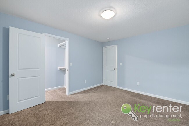 Building Photo - Newly Built 3 Bedroom Beauty: Lawn care and trash included!