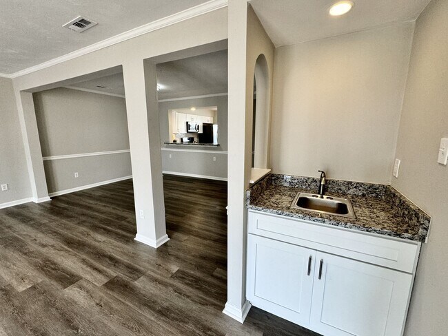 Building Photo - COMPLETELY Updated & Ready 08-21-26!! Sparkling Community Pool - Pet Friendly - Fenced Backyard!