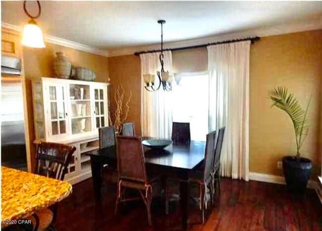 Building Photo - WATERFRONT W/BOAT SLIP!!!! This beautiful home is located in a gated community on North Lagoon Dr...