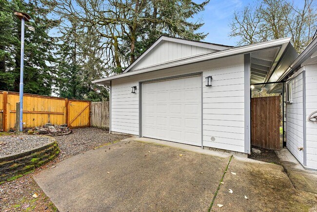 Building Photo - Charming Tacoma Home with A/C, RV Parking, Workshop & Skylit Living Room