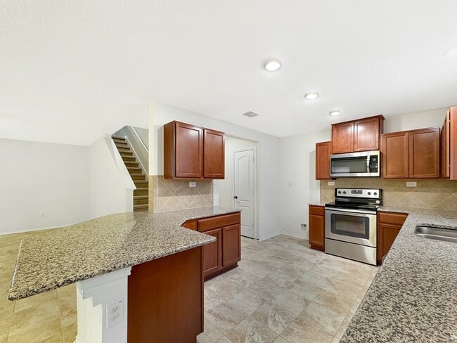 Building Photo - 8018 Assumption Dr