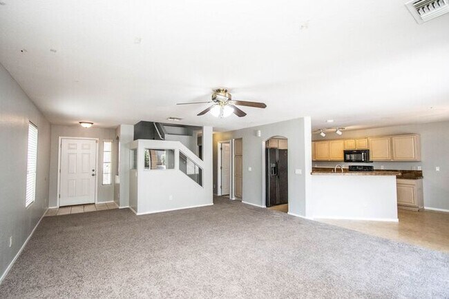 Building Photo - Welcome to this beautiful 4 bedroom, 3 bathroom home in San Tan Valley, AZ.