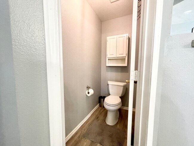 Toilet room with door for privacy - 11519 Brae Hill