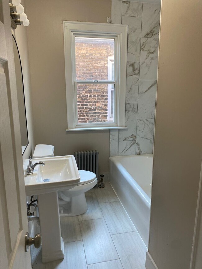 Building Photo - 8707 S Manistee Ave